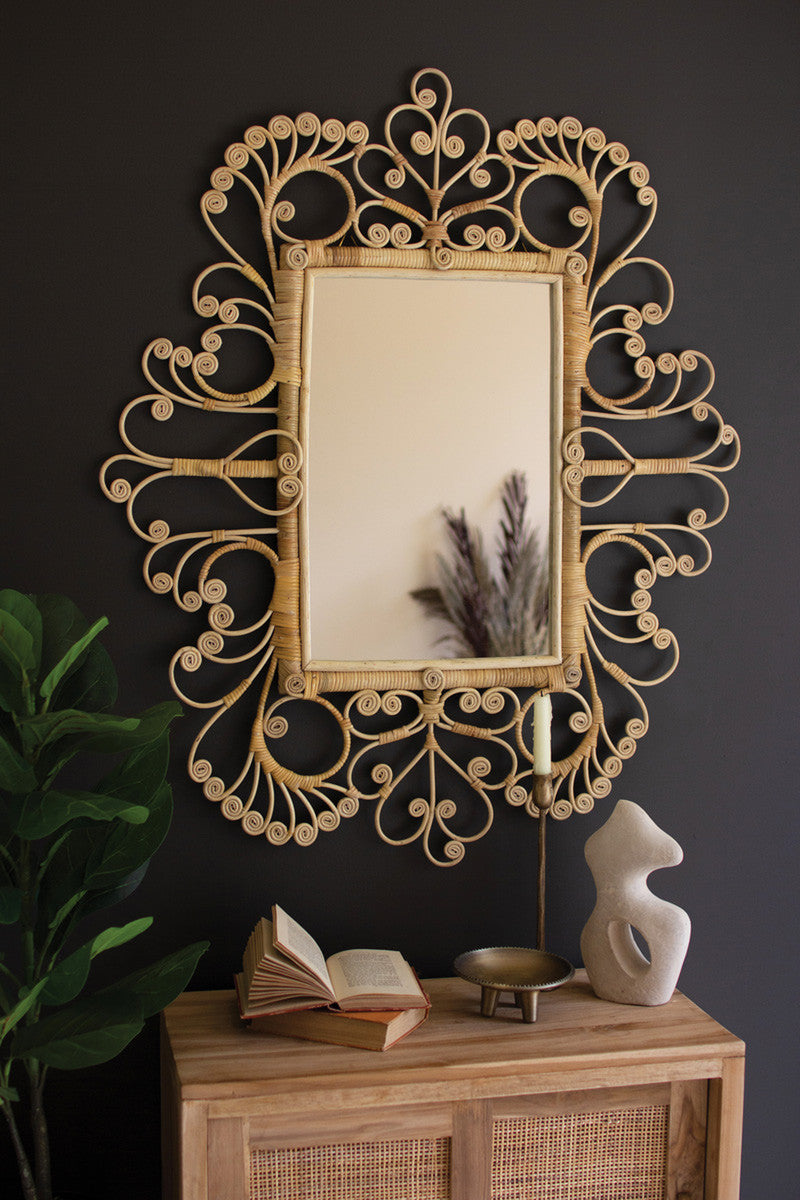 ornate rectangle mirror on dark wall 