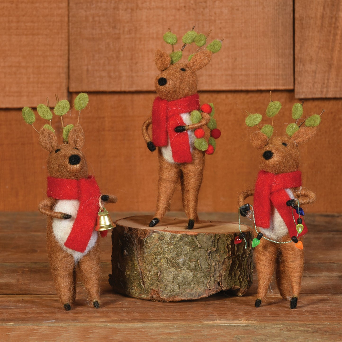 Christmas-ornament-cute-felt-reindeer-set-of-three-on-table