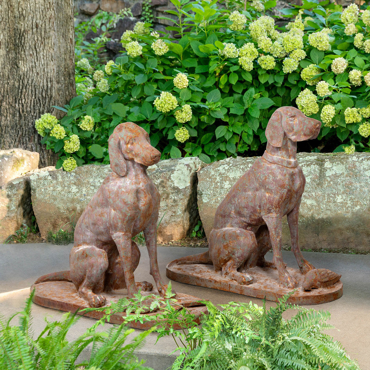 cast iron hound dog in hydrangea garden