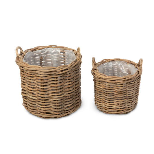 handwoven rattan floor baskets set of two white background