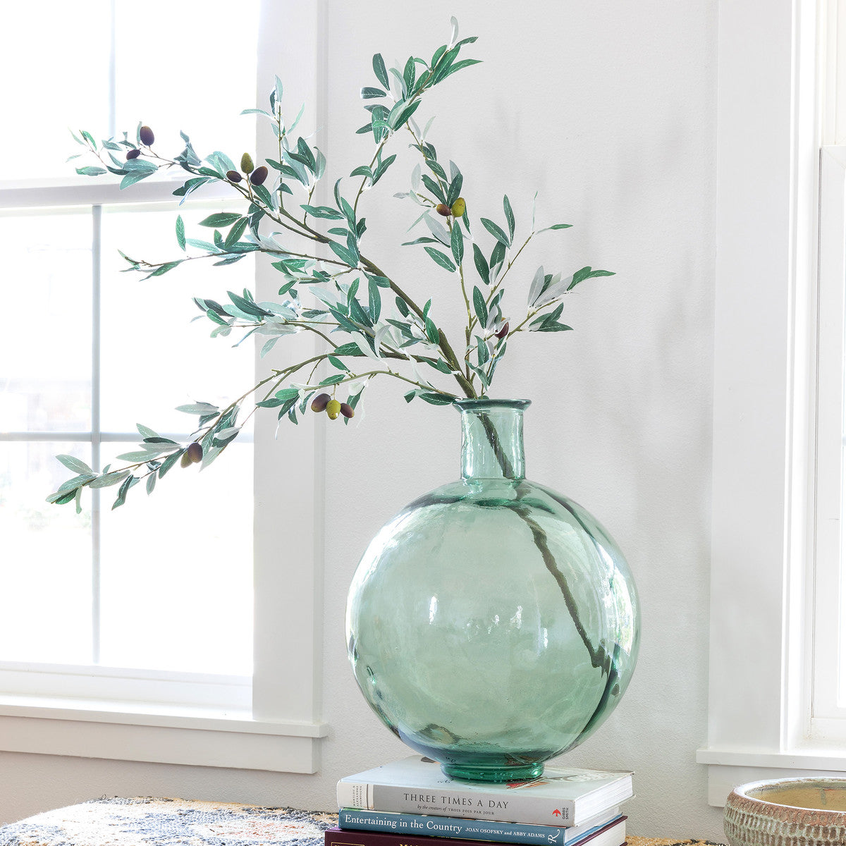 faux-artificial-olive-branch-in-vase