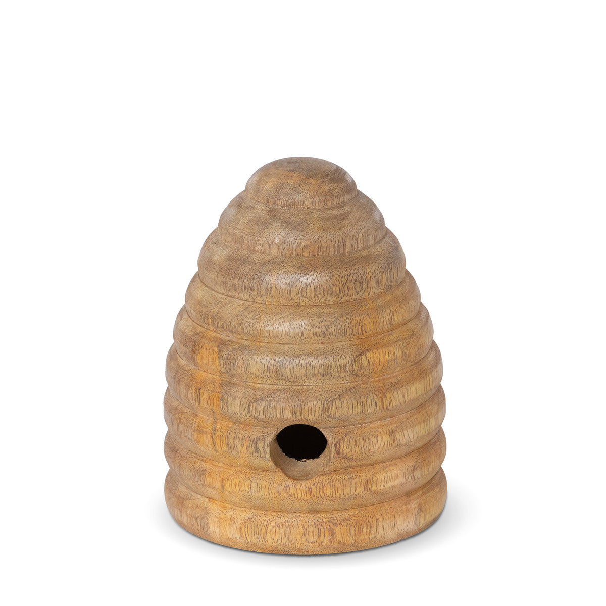 small carved wood tabletop beehive white background