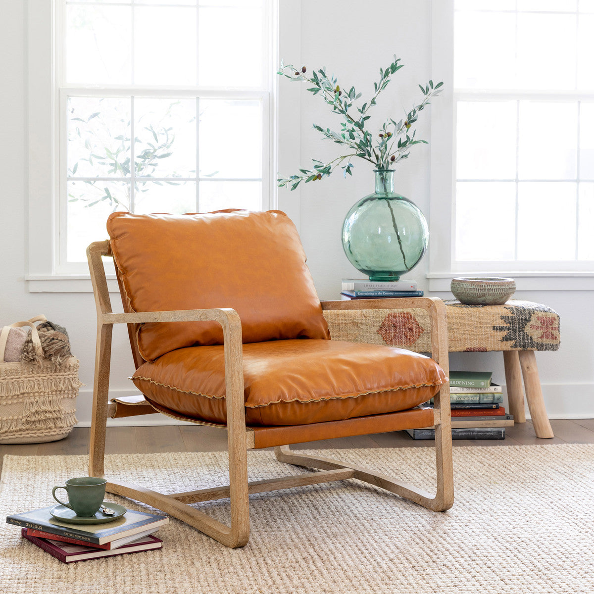 modern vegan leather brawn chair in cozy nook near windows