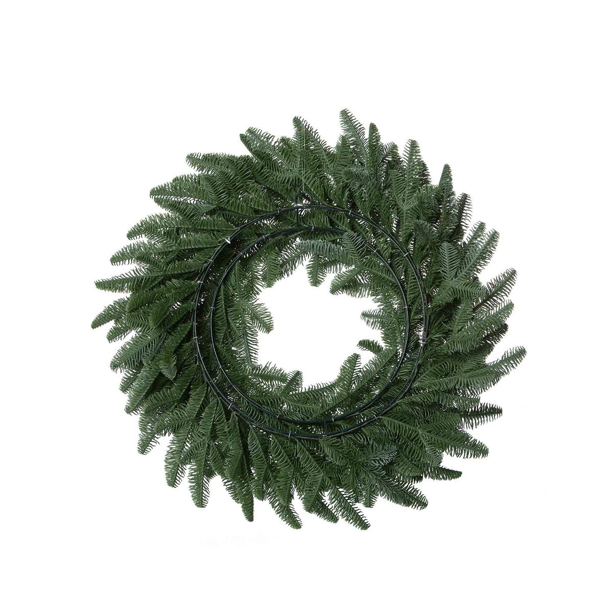 the back of a faux artificial green noble fir wreath on white background