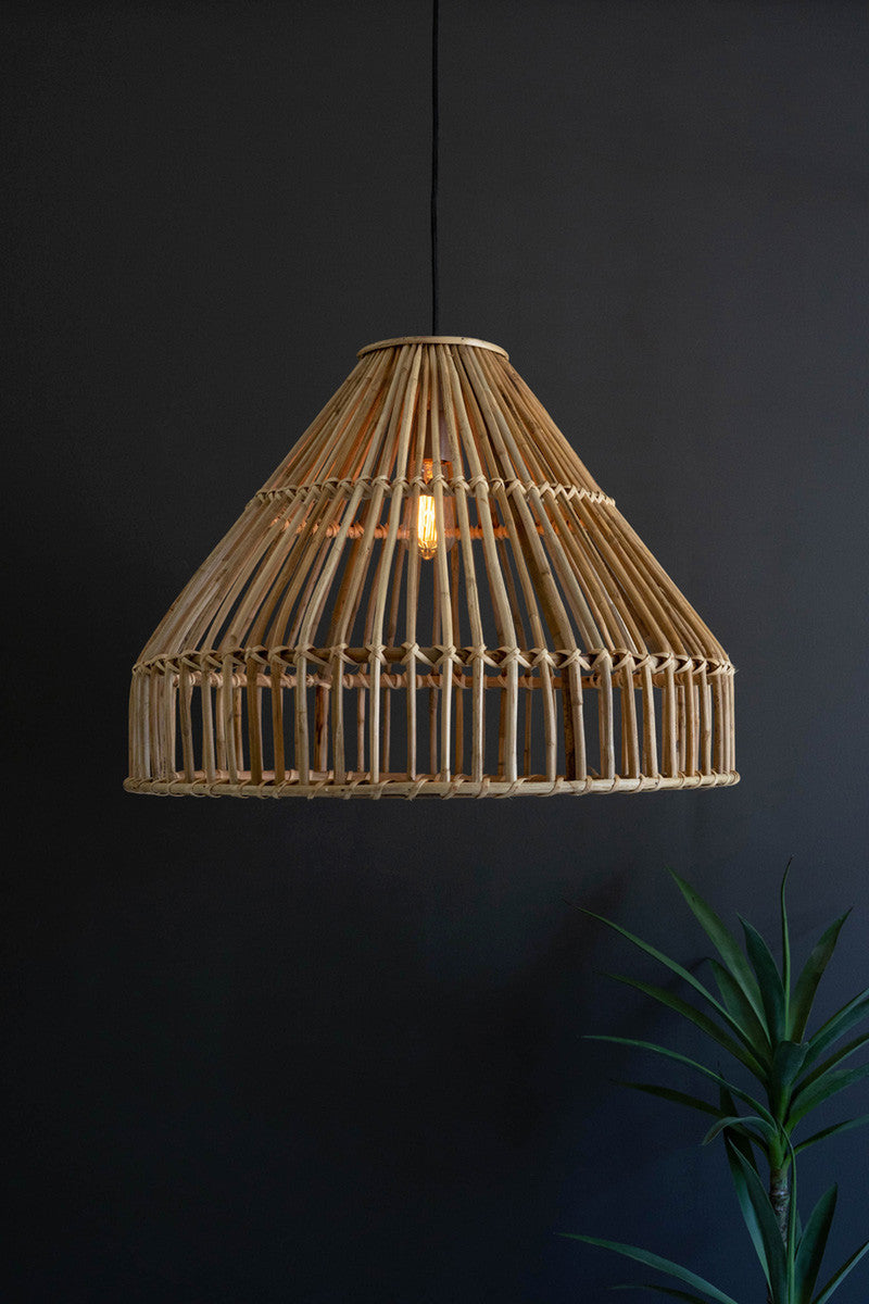 large-bamboo-lamp-with-light-on-and-plant-in-the-room