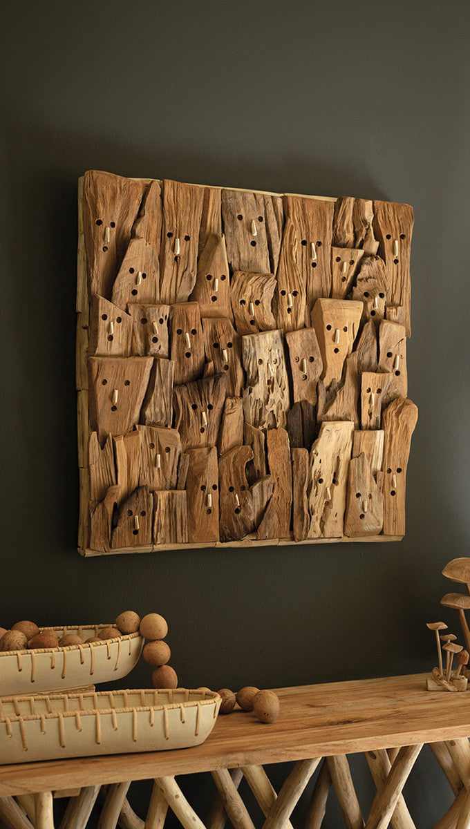 modern driftwood faces wall art with wood buffet 