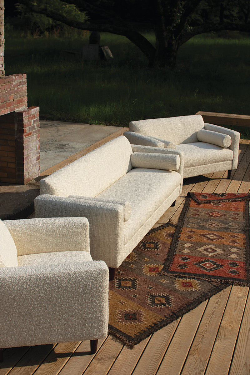 modern white sofa and chairs outdoors