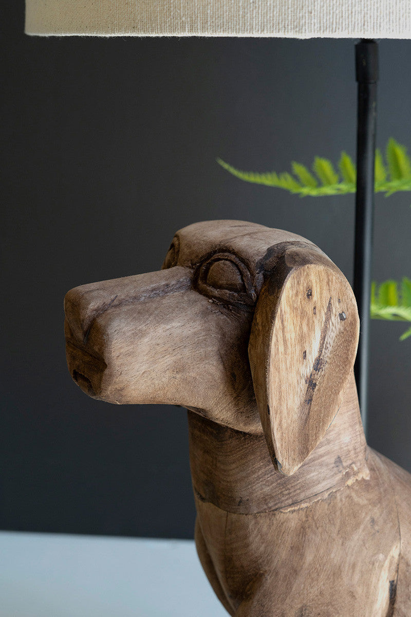 close up of wooden dog table lamp 