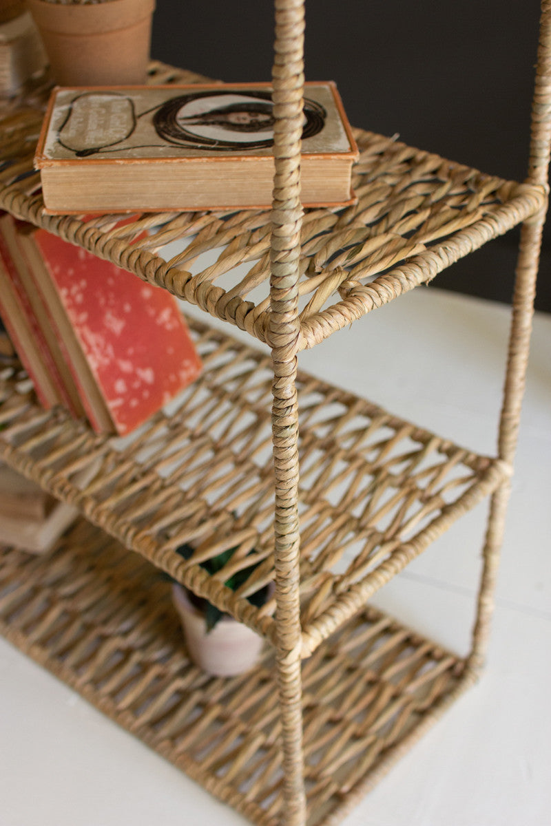 woven seagrass house with shelves