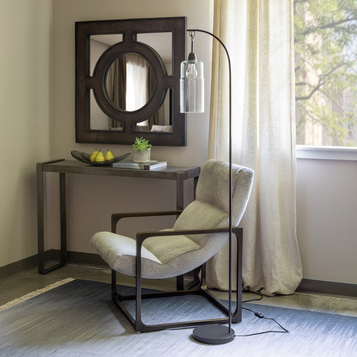 floor lamp near a window with a chair
