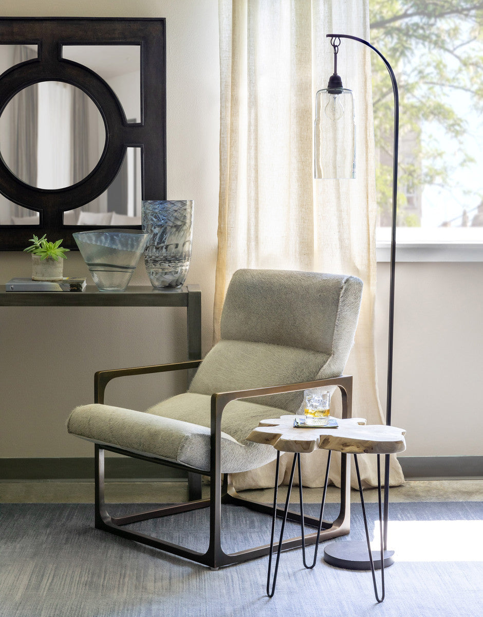 floor lamp over a chair in a reading nook