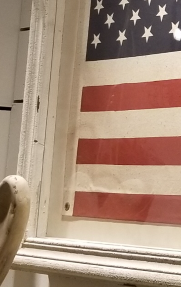 framed american flag under glass  detail  