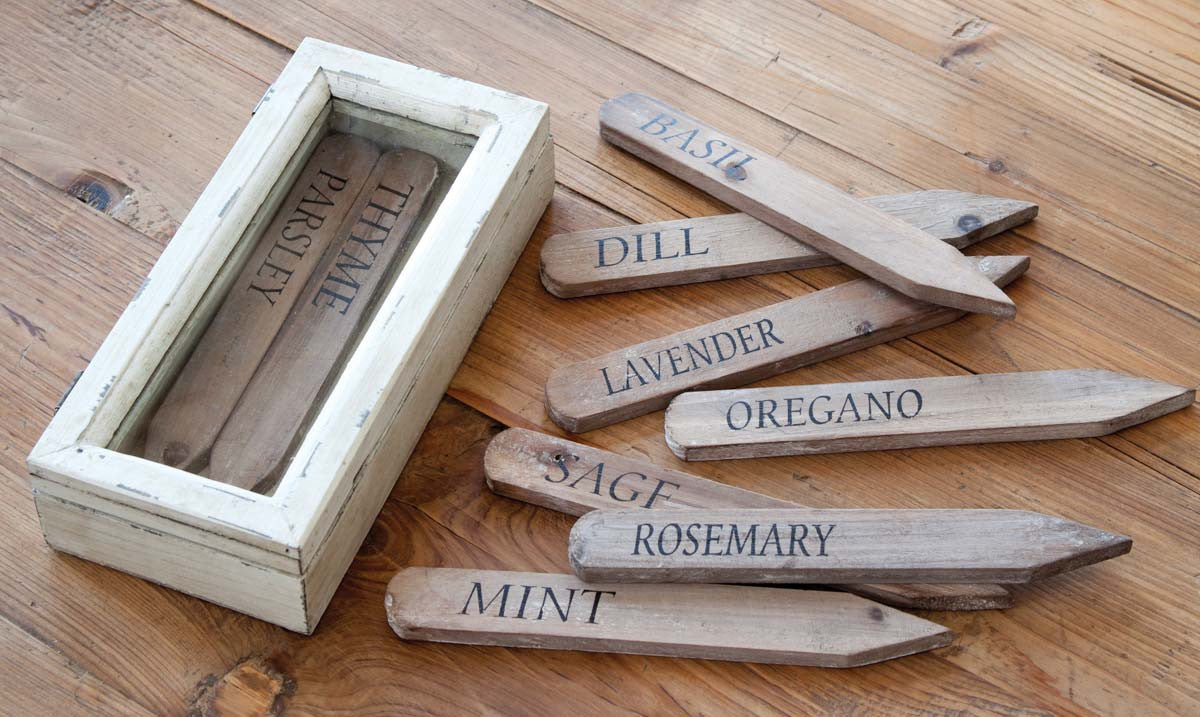 Wooden Herb Plant Stake Garden Markers in Wooden Box on wood table  