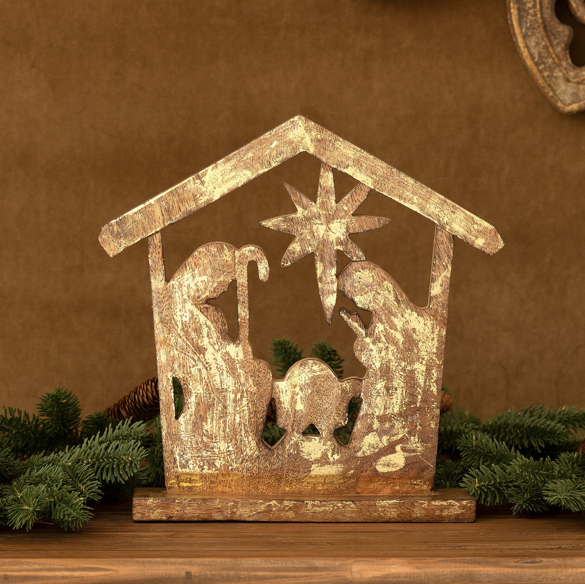 wood-gold-carved-nativity-christmas-decor-on-mantel